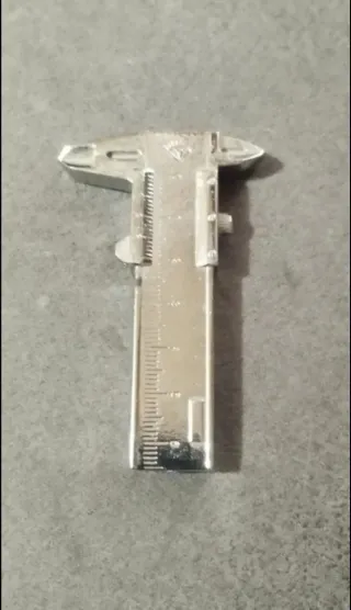 Mechero de colección calibrador