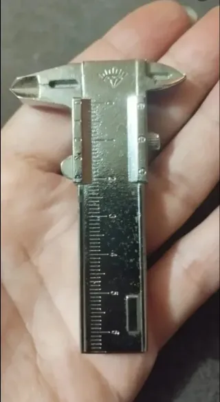 Mechero de colección calibrador