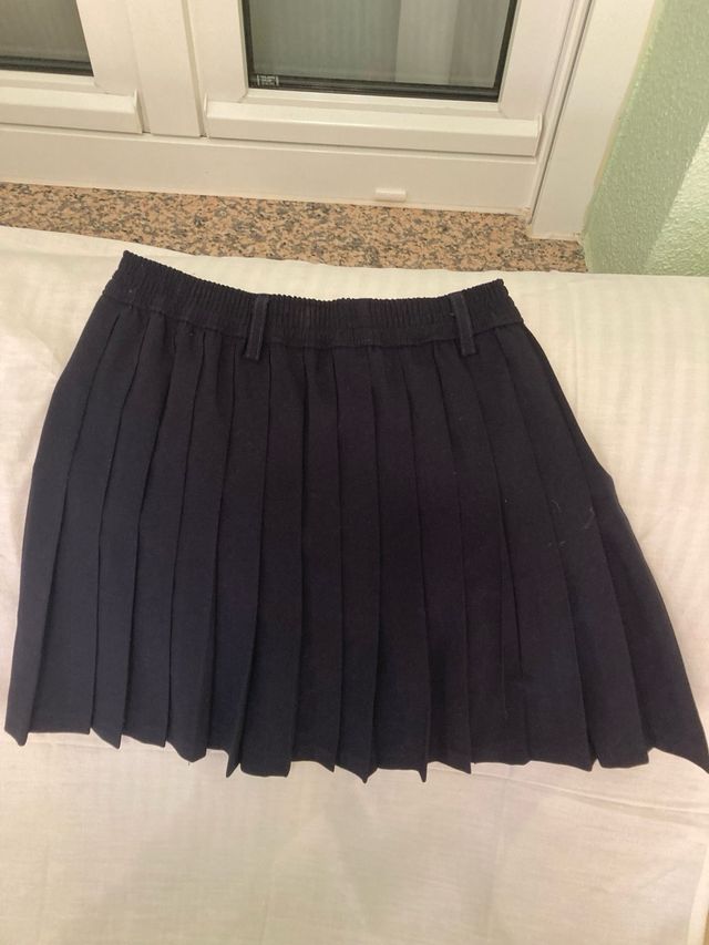 Falda plisada azul marino talla 7