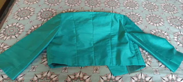 Torerita satén azul turquesa fiesta, de Carla Ruiz