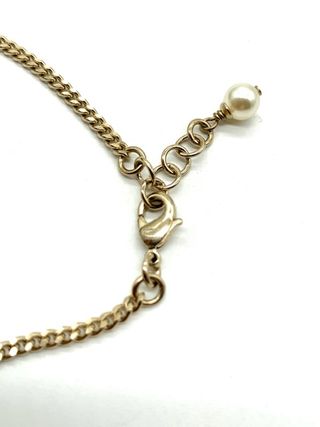 Pulsera dorada Chanel