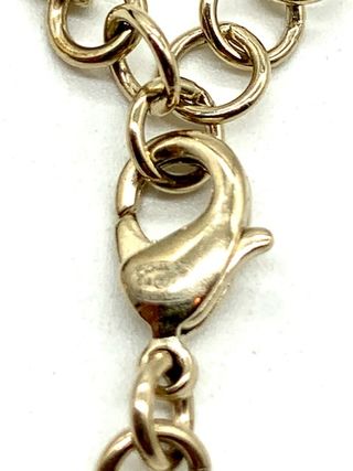 Pulsera dorada Chanel