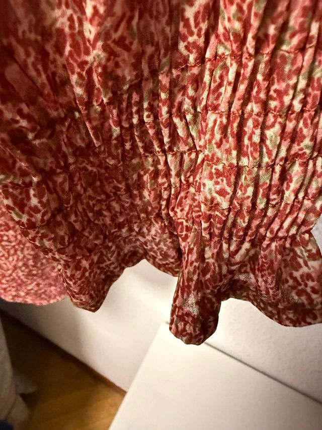 Blusa escote alto estampado floral