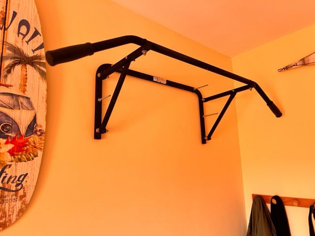 Barra de dominadas plegable