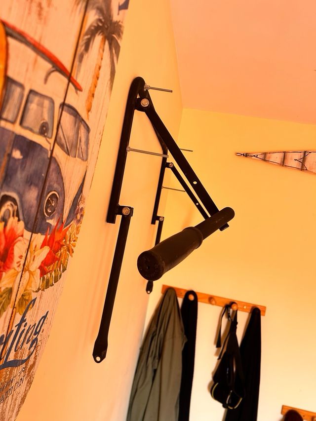 Barra de dominadas plegable