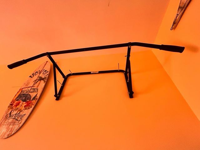 Barra de dominadas plegable