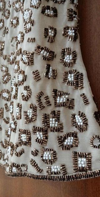 Top con paillettes beige e oro