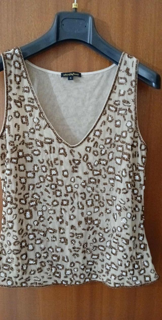 Top con paillettes beige e oro