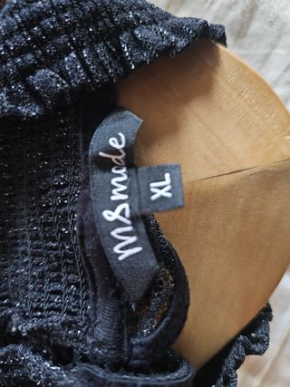 Blusa negra con brillo y cuello alto – MS Mode XL