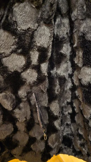 Plumas reversible negro talla M