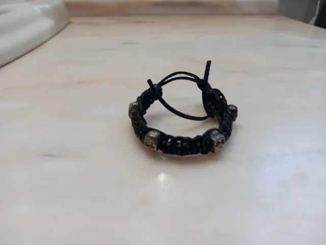 Pulsera calaveras y anillo calavera