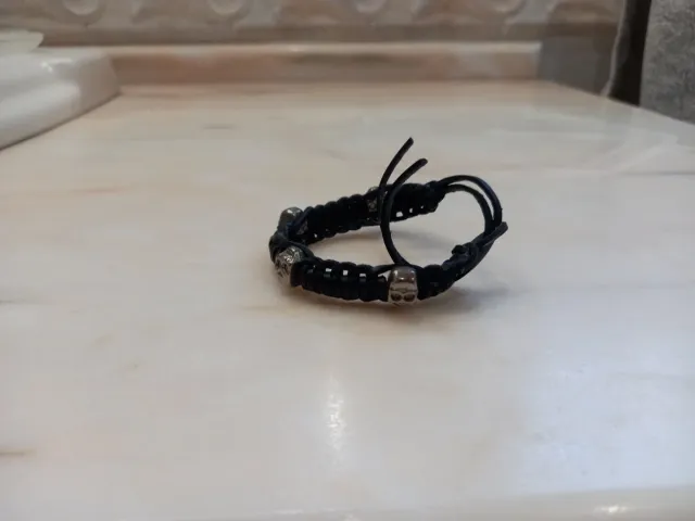 Pulsera calaveras y anillo calavera