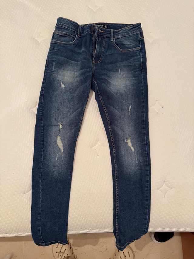 Vaqueros hombre desgastados