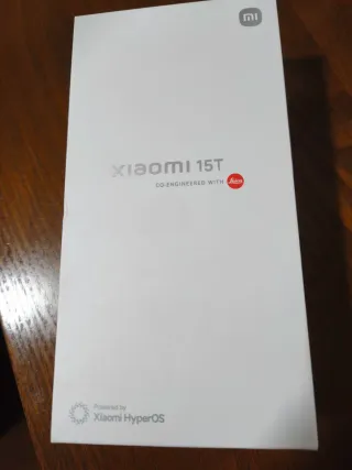 Móvil Xiaomi plateado sin abrir regalo Patinete