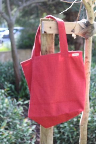 Bolsa de tecido às riscas