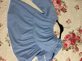 Top donna azzurro con maniche a campana