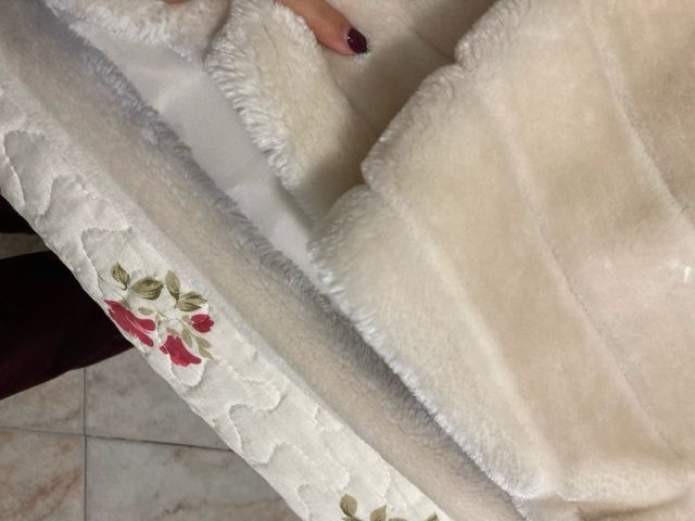 Cappotto beige in pelliccia sintetica