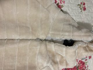 Cappotto beige in pelliccia sintetica