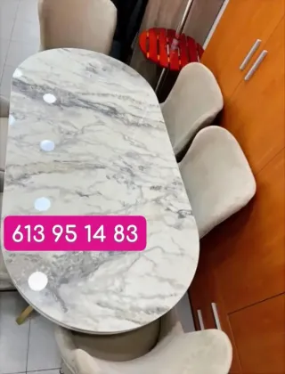 Mesa de comedor ovalada con 6 sillas