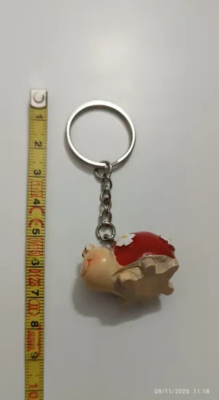 Portachiavi coccinella rossa con fiori