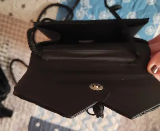 Cartera de fiesta negra con flecos