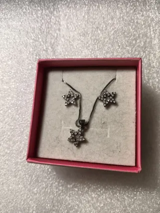 Parure collana e orecchini a stella