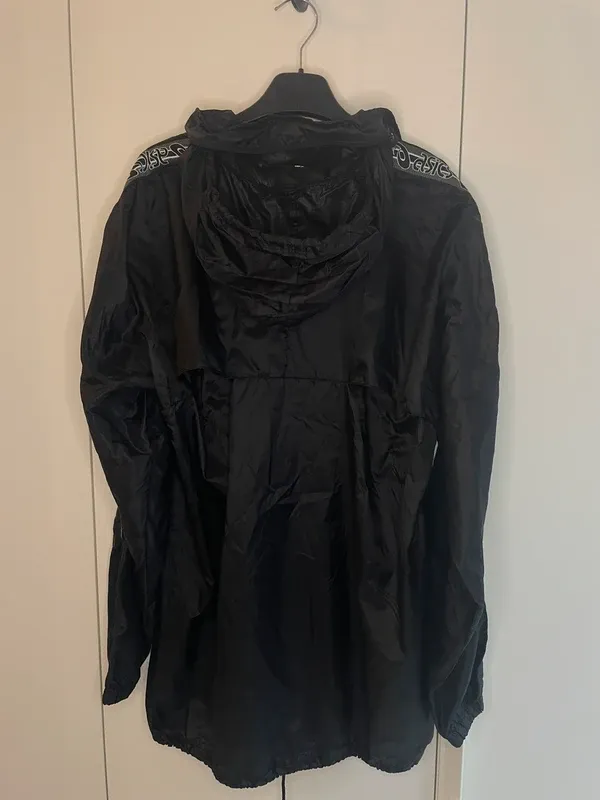 ASICS vintage giacca a vento nero impermeabile