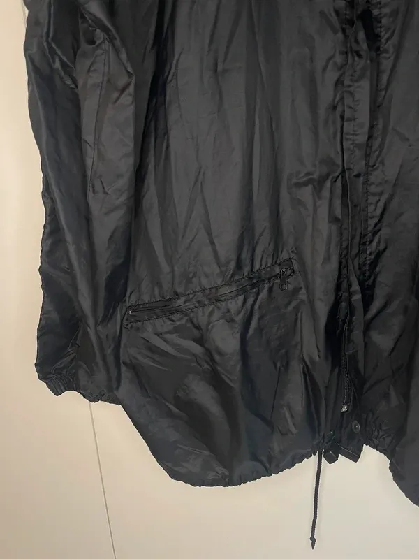 ASICS vintage giacca a vento nero impermeabile