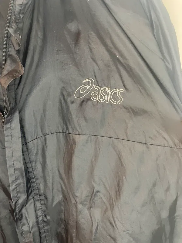 ASICS vintage giacca a vento nero impermeabile