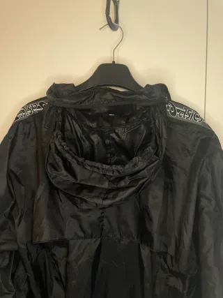 ASICS vintage giacca a vento nero impermeabile