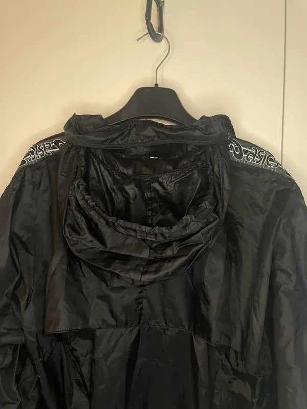 ASICS vintage giacca a vento nero impermeabile