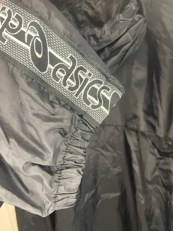ASICS vintage giacca a vento nero impermeabile