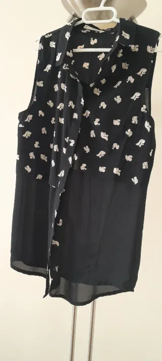 Blusa oversize sin mangas talla S Marca Mango