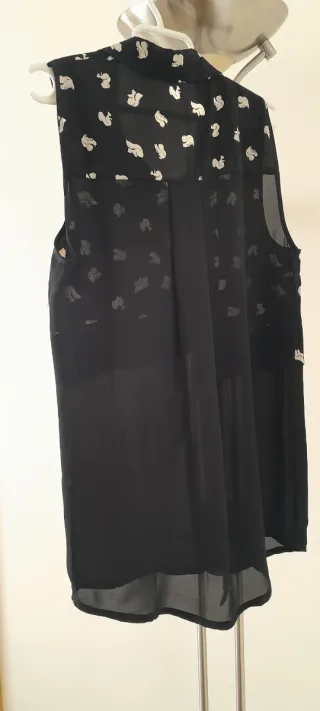 Blusa oversize sin mangas talla S Marca Mango