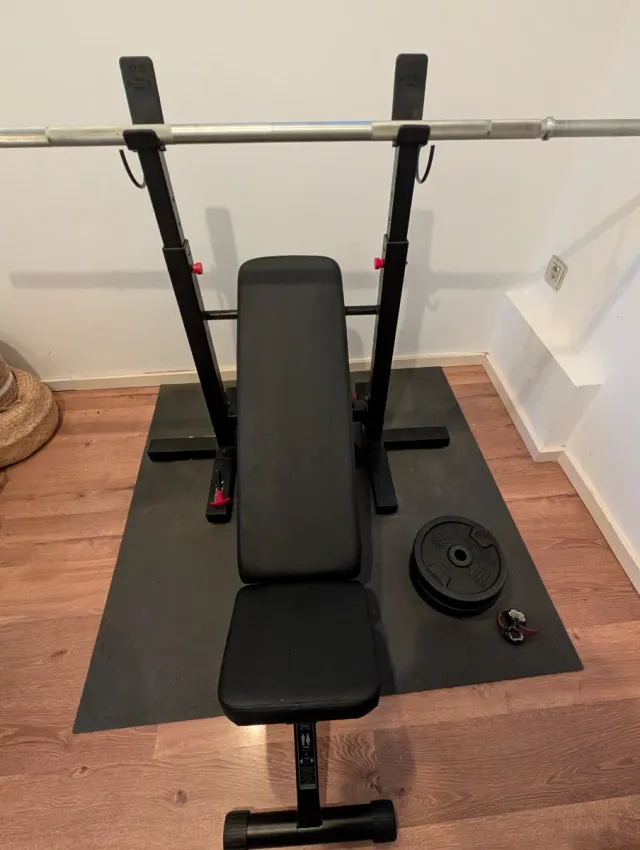 Banco de pesas con discos