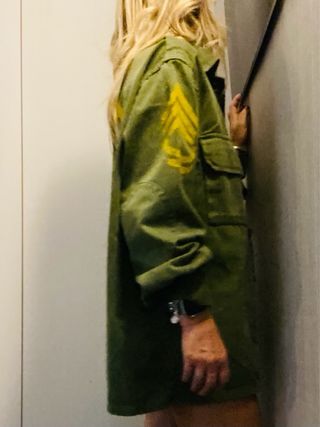 Camisa verde con estampado Woodstock