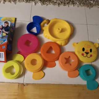 Juego apilable Playskool León y tren de madera