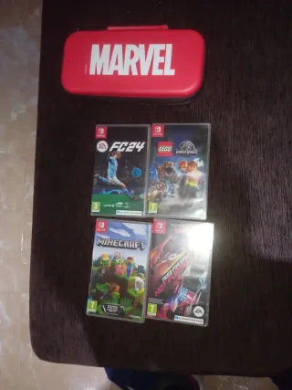 Nintendo Switch OLED + 3 Juegos + Funda Marvel