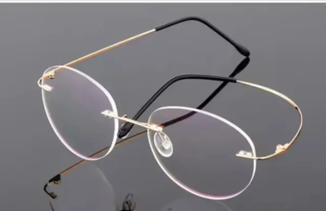 Gafas redondas sin montura doradas