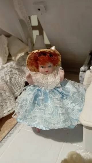 Bambola porcellana casa bambole