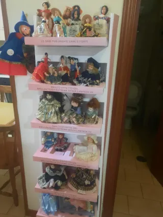 Set bambole in ceramica. 23 pezzi