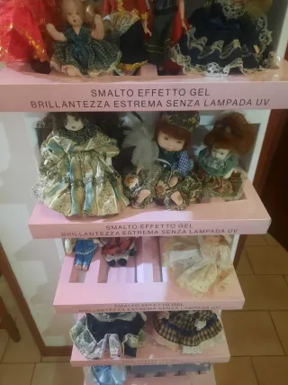 Set bambole in ceramica. 23 pezzi