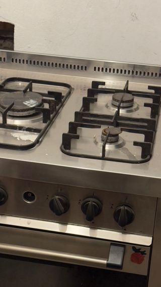 Cocina de gas Mempasa 5 fuegos con horno eléctrico