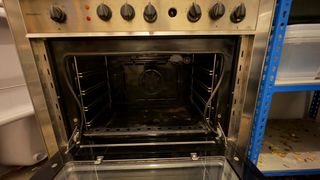 Cocina de gas Mempasa 5 fuegos con horno eléctrico