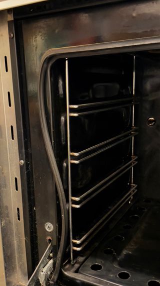 Cocina de gas Mempasa 5 fuegos con horno eléctrico