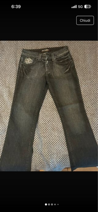 Jeans donna con motivo su tasca