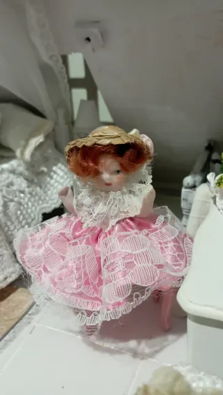 Bambola porcellana casa bambole