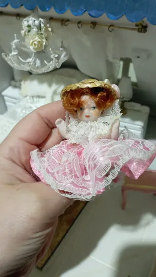 Bambola porcellana casa bambole