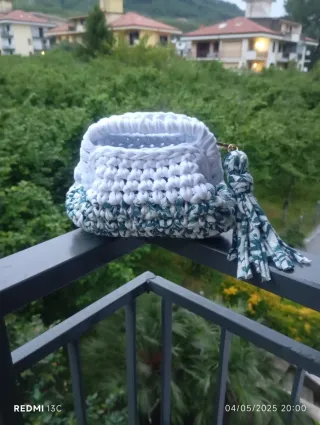 Clutch bag in fettuccia