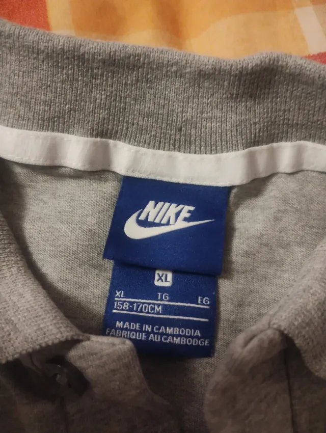 Polo Nike gris manga corta